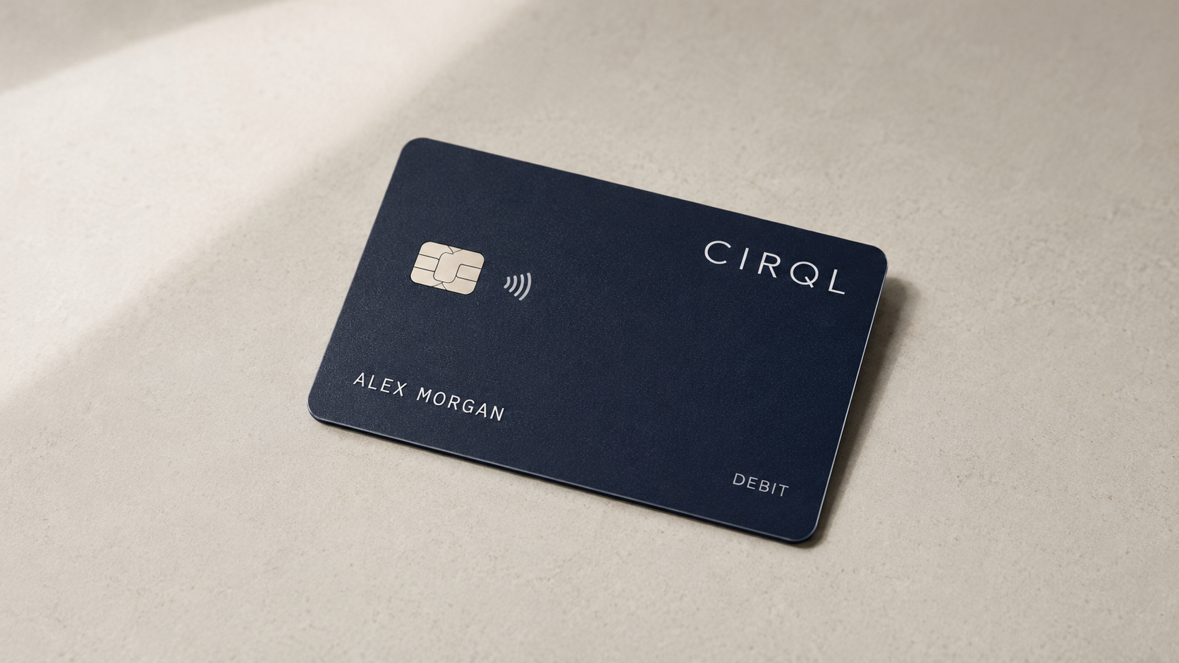 A realistic navy CIRQL card for Alex Morgan on a neutral stone surface